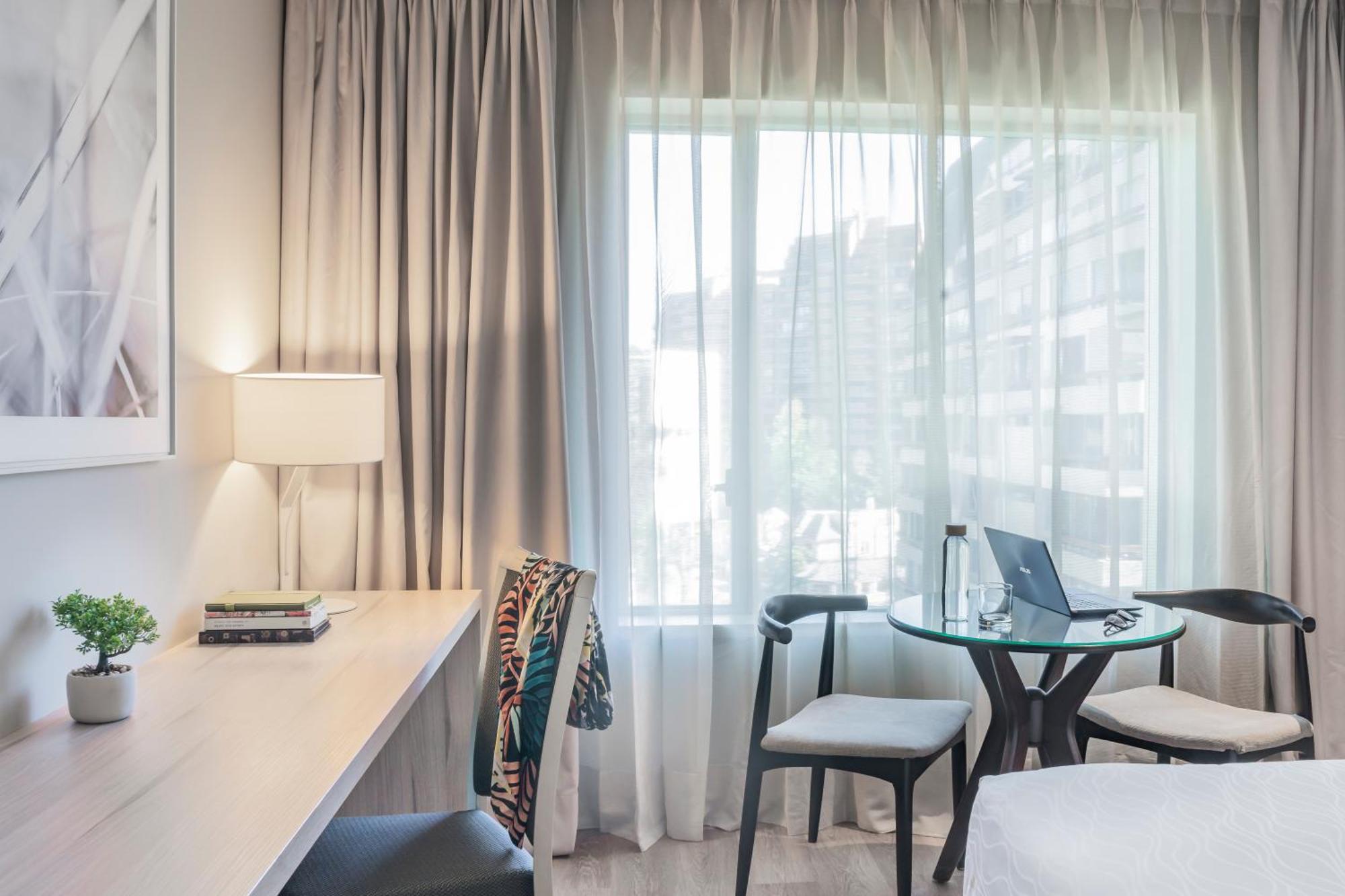 Pullman Santiago Vitacura Екстер'єр фото A room at the hotel